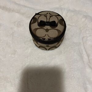 Brown and Tan Round Jewelry Case